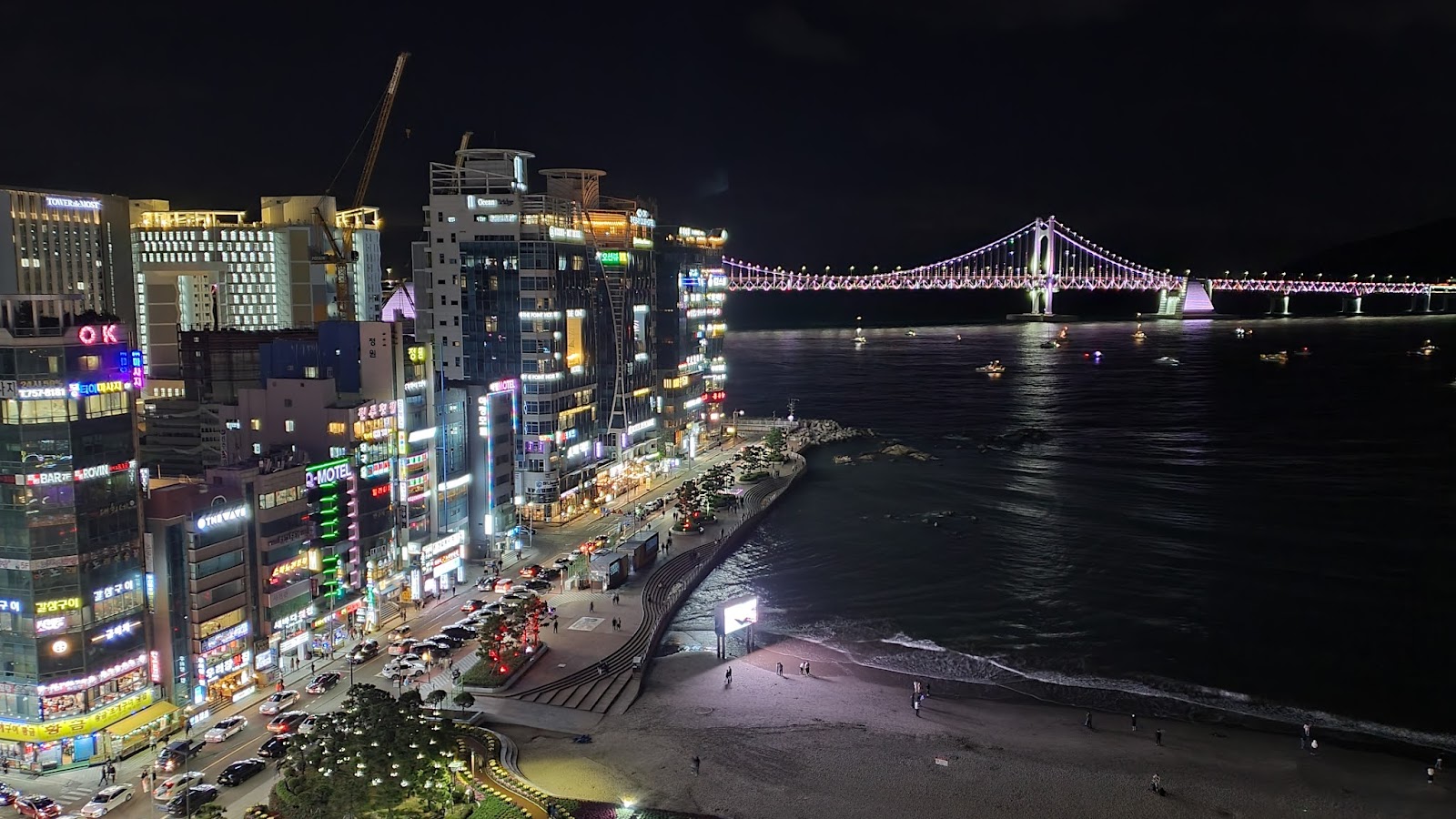 Gwangalli Beach at night with the lit Gwangan Bridge, Busan
